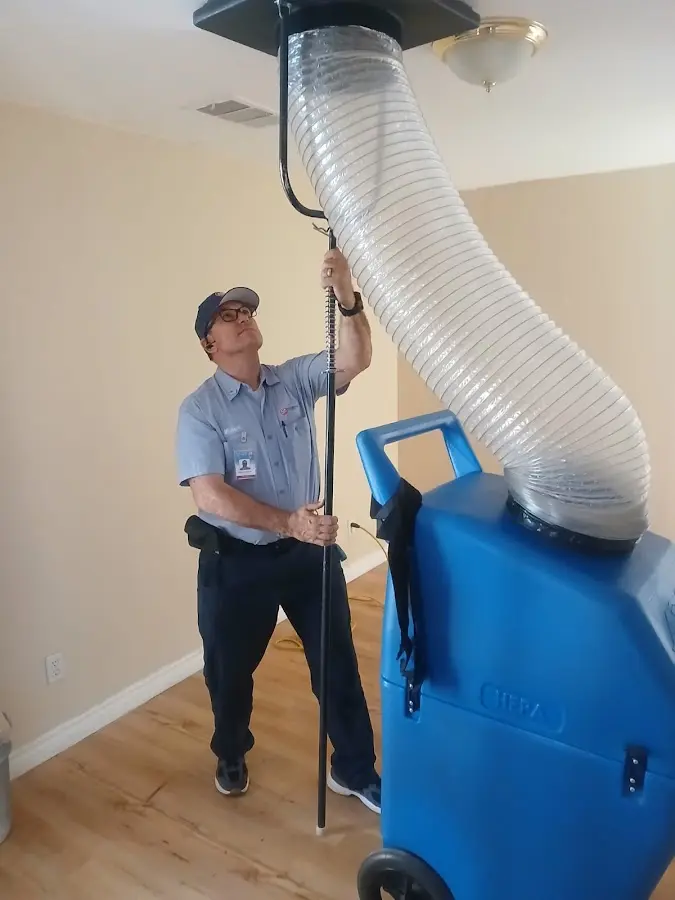 Furnace Tune-Up technician using HEPA equipment in Philadelphia